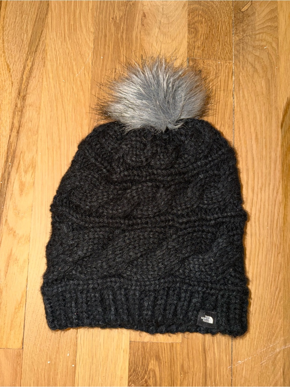 The North Face Black Knit Beanie with Gray Faux Fur Pom Pom